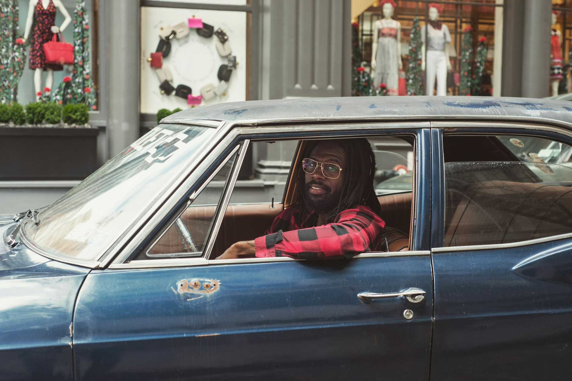 Image shows a man sitting in the driver's seat of a car. This is to show that Argyle Fox Publishing does more than provide author portals. We put you in the driver's seat of your publishing experience.