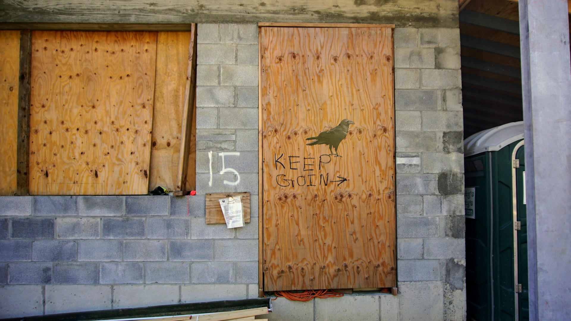 Image shows a boarded up building to illustrate what happens when a publishing company closes.