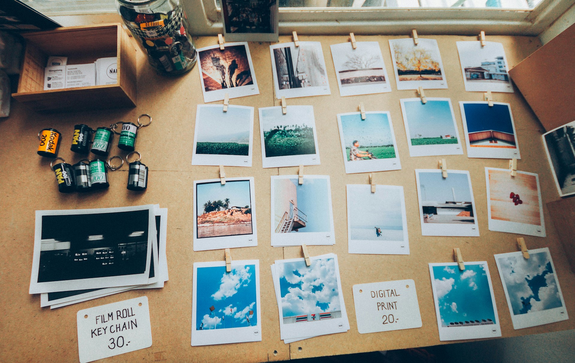 Image shows variety of Polaroid photos to illustrate the idea of whether authors should publish a memoir.