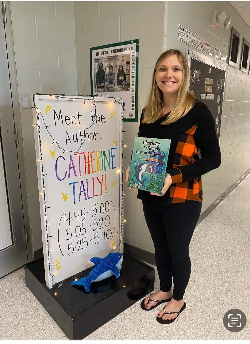 Picture book author Catherine Tally with her new book, Charlotte the Shark Goes to the Dentist